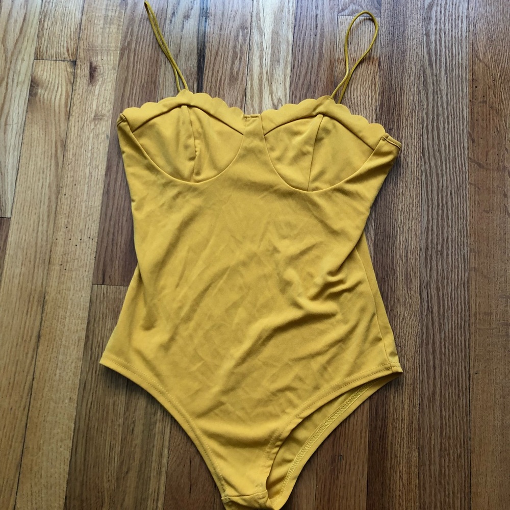 Yellow body suit